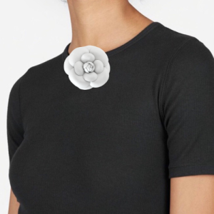Tees with flower brooch