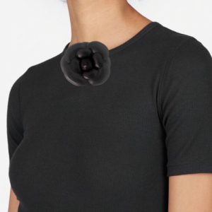 Tees with flower brooch